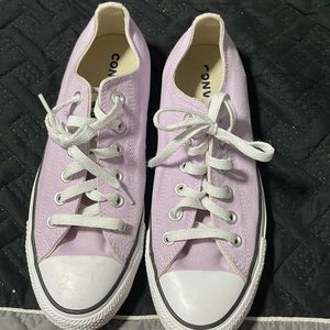 Low top Chuck Taylors.  In good used condition.
